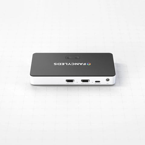 Ambient TV Backlighting Sync Box With HDMI Two Point Zero For 56 Inch To 65 Inch TVs Creates Immersive Color And Audio Sync device shown