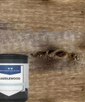 Saddlewood Reactive Wood Stain Lays Down A Deep Colonial Brown Coat With Real Tannin Action To Give Your Deck That Authentic Weathered Charm In A Straight Up Five Gallon Bucket on wooden surface