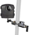 Hella Rugged Construction Time Lapse Camera Bundle With 1080p Waterproof Housing mounted on a pole with a clamping mount.
