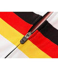 Close-up of a colorful striped fabric with a visible zipper.