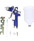 Top Tier Gravity Feed Hvlp Spray Gun With Six Hundred Cc Cup, blue spray gun, 600cc cup, and cleaning tools for automotive and woodworking coatings.