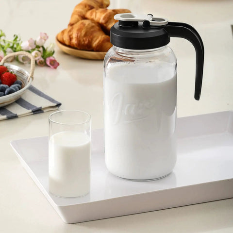 2 Quart Glass Pitcher With Lid Airtight Leakproof Mason Jar Pitcher With Filter Lid Wide Mouth Glass Jar on tray