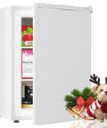 White 3.0 Cu Ft Upright Freezer With 7 Adjustable Temp Settings Compact Mini Freezer with open door and festive dog in reindeer costume.