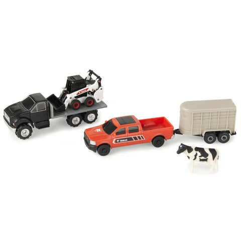 1/64 Scale Farm Toy Set With Rollback Truck, Livestock Trailer, Pickup, Cow And Skid Loader Five Piece Farm Equipment Playset