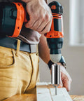 Man using power drill with Universal Socket Tool Set With Power Drill Adapter 7 To 19 mm Gift For Him on wooden plank