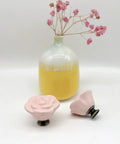 Grab This Dope 10 Piece Set Of Pink Rose Porcelain Cabinet Knobs Perfect For Dressing Up Drawers And Dressers. 1.4 Inch ceramic rose knobs in pink with brass screws.