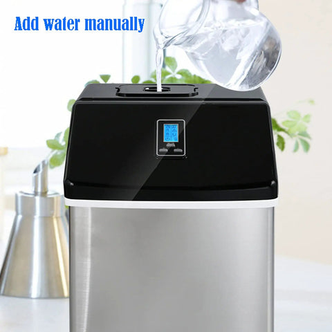 Slick Countertop Ice Cube Maker, Portable Electric Unit With Foolproof Touch Controls, Effortless SelfCleaning Cycle, Clear Viewing Window, Quick Freeze And Zero Hassle with water pouring into top.
