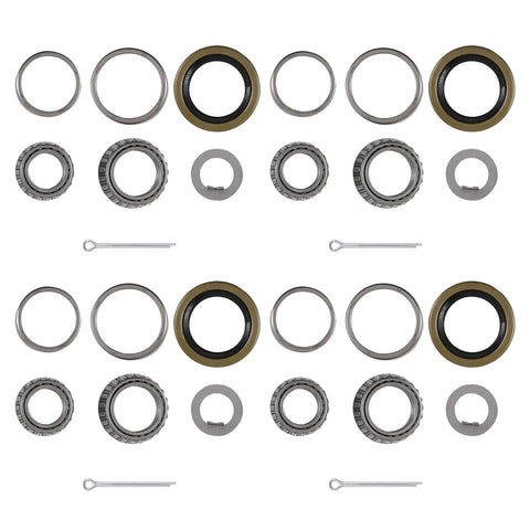 Top view of 4-set trailer axle bearing kit with bronze seals, steel bearings, and retaining components for #84 spindle