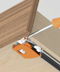Complete 18 Inch Drawer Slide Kit With Integrated Blumotion Soft Close being installed, showing screwdriver on locking device