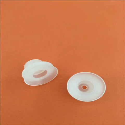 Built Like A Tank Double Industrial Vacuum Suction Cup With Automatic Chuck For Robotic Manipulators And No Sweat Production Line Work Gets Done Right In Dp Four Five Pack - two white suction cups on orange background.