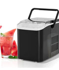 Portable Ice Maker Makes 26.5 Pounds Of Fresh Bullet Ice Daily With Zero Effort Self Cleaning Mode next to a cocktail.