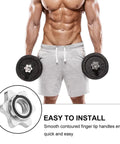 Man holding dumbbells with 6 Pack Spinlock Dumbbell Collars For 1 Inch Bars, Heavy Duty Steel And PVC Construction visible