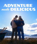 Two people embracing by a lake under the text 'Adventure made delicious' symbolizing Freeze Dried Diced Chicken For Survival Meals In A 10 Can Gluten Free 14 Servings Just Add Water And Ready In Under 10 Minutes Ideal For Camping Hiking Bug Out Or Emergency Kits