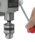Sturdy Mini Bench Drill Press For Woodworking And Metal Crafting, showing precision chuck adjustment for various speeds.