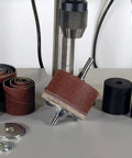 Drill press with Turn Your Drill Press Into A Dope Power Spindle Sander Kit including 5 sanding drums and assorted sleeves.
