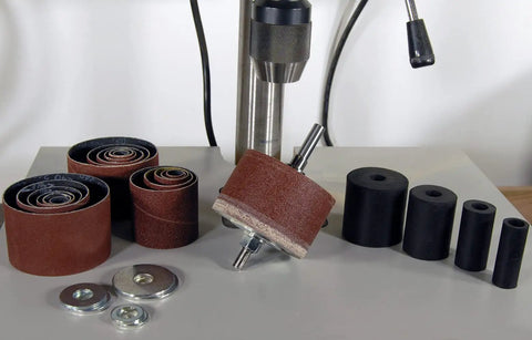 Drill press with Turn Your Drill Press Into A Dope Power Spindle Sander Kit including 5 sanding drums and assorted sleeves.