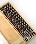 Six Piece Eighteen Inch Auger Bits Drill Set With Half Inch Shank Woodworking Tools in wooden case for deep hole drilling.