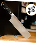 Boss Grade Stainless Steel Knife Handle Screws With Locking Spindle Pins Two Pack on wooden cutting board with knife.