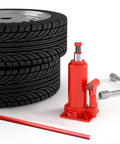 Heavy Duty Floor Jack Handle Replacement With Textured Grip Sleeve For 50 Ton Hydraulic Bottle Lifts next to black tires and tools.