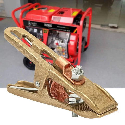 500A Welding Ground Clamp Copper Grip Brass A Shape Earth Clamp for MIG TIG ARC Welding Machines with red generator backdrop