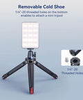 Two Pack Pro Grade Mini Ball Head with removable cold shoe mount on tripod, 1/4 inch threaded holes visible, holding LED light