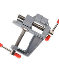 Premium Clamp On Vise With A Quick 35mm Jaw Opening For Workbenches, heavy-duty gray metal clamp for securing projects.