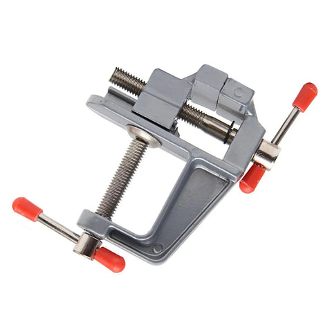 Premium Clamp On Vise With A Quick 35mm Jaw Opening For Workbenches, heavy-duty gray metal clamp for securing projects.