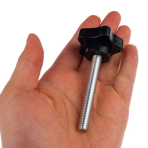 Kasteco M8 x 60mm star hand knob with black knob and silver threaded stud, held in hand