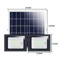 Solid Solar Flood Light With A Kickin Brightness Setup And Zero Sweat Weather Proofing For Your Patio Decks And Yard Upgrades Including remote controls beside solar panel.