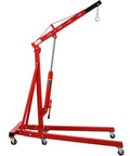 Heavy Duty Two Ton Folding Engine Hoist Cherry Picker Shop Crane with hydraulic ram and six swivel casters for easy movement.