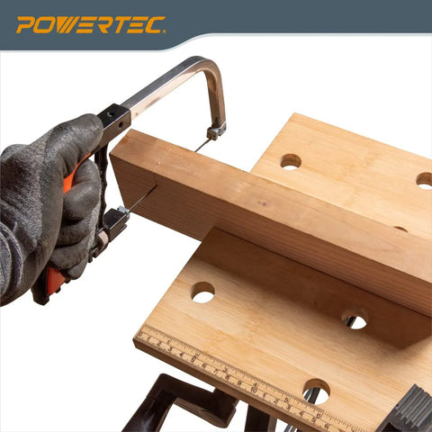 Portable Small Workbench With Vise And Ruler Protractor Scale in use, showing folding sawhorse worktable cutting wood.