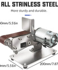 Badass Mini Electric Belt Sander Grinder With 7 Position Adjustable Desktop Polishing Rig For Smoothing Wood Metal Acrylic And Knife Sharpening In Home Or Workshop, stainless steel design with motor and adjustable belt.
