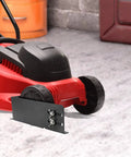 Lawnmower Wheel Boot Steel Bracket To Secure Your Mower On Open Or Enclosed Trailers And In The Garage, Adjustable For 8 To 10 Inch Wheel, Black attached to red mower