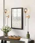 Dope Mid Century Smoke Glass Plug In Wall Lights Two Piece Brushed Brass Globe Sconce Lamps in modern hallway decor setup