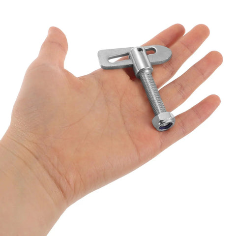 Rock-Solid Alloy Trailer Locking Pin With Long Screw For Secure Hitch Connector held in hand, showing heavy-duty T-shaped fastener.