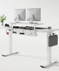 Adjustable Height Standing Desk With Raised Monitor Platform And Sleek Cable Tray For A Sick Home Office Setup That Will Keep Your Workspace Dope And Totally Clutter Free featuring dual monitors and integrated storage.