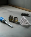 Killer 20PC Stainless Steel Woodruff Key Set 3 By 05 CM silver keys stacked beside tools on a garage floor