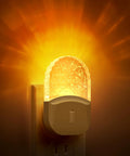 Cozy Amber Warm Night Light Two Pack Plug In Wall LED Night Lights with Dusk to Dawn Sensor 1800K glowing in dark room.