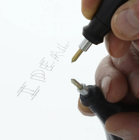 Hands using Electric Engraver With Carbide Tipped Point, 120V 60Hz, 7200 SPM, marking "IDEAL" on surface