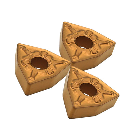 Three gold triangular carbide turning inserts with center hole for steel machining.