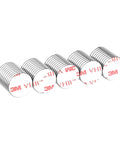 Five 1/2-inch round neodymium magnets with 1/16-inch self-adhesive backing (3M VHB), angled side view.