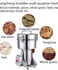 Fully Automatic 2000G Electric Grain Mill Grinder Swing Type Pulverizer with ingredients including spices, herbs, and grains
