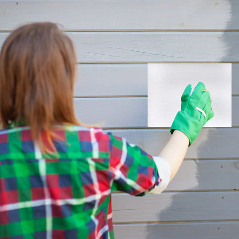 Person applying Vinyl Siding Repair Patch Kit 6x8 Inch Self Adhesive PVC Tape Hole Cover For Mobile Homes Skirting Fences.