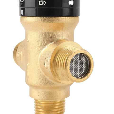 Front close-up of TreMax thermostatic mixing valve, solid brass, golden finish, with NPT threads and mesh screen