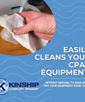 CPAP cleaning wipe held in hand; Kinship Comfort Brands unscented, lint-free wipes for CPAP equipment, 150-count.