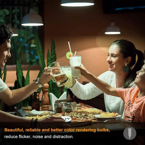 Family dining under Daylight 6000K 16W LED E12 Candelabra Bulbs delivering 1500 lumens, enjoying cozy ambient light
