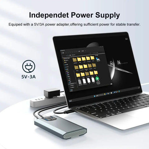 Independent power supply for Killer Dual Bay M.2 NVMe RAID Enclosure with 5V/3A adapter connected to laptop.