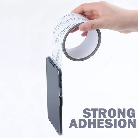 Heavy Duty Adhesive Window Screen Repair Tape Kit Patch For Tears And Holes In Doors And Windows Waterproof Fiberglass Mesh With Works Like A Champ Black 1 Pack demonstrating strong adhesion by holding a smartphone.