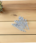 Heavy Duty Lawn Aerator Spikes 12 Pc Set Metal Spikes For Grass Care shown on wooden surface