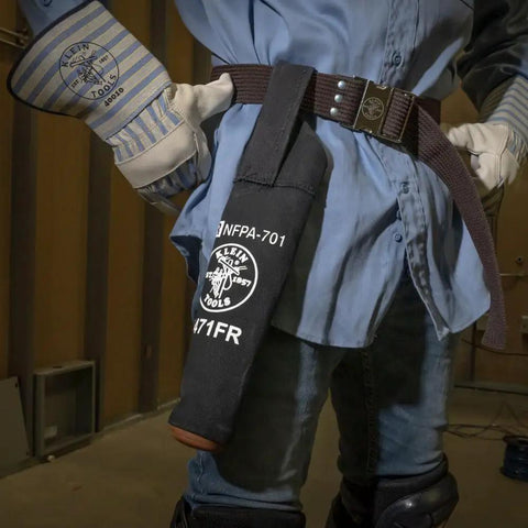 Person wearing flame-resistant electrode bag with hard leather bottom and belt loop, heavy-duty No 4 canvas, NFPA 701 compliant